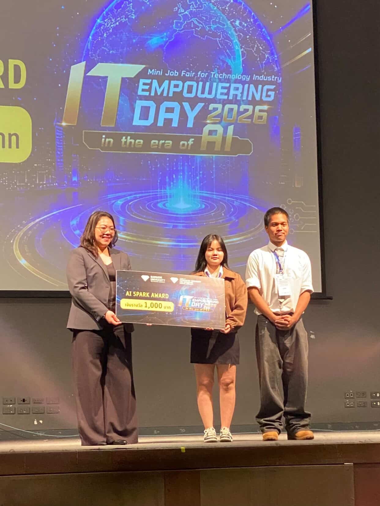 Receiving the AI Spark Award on stage