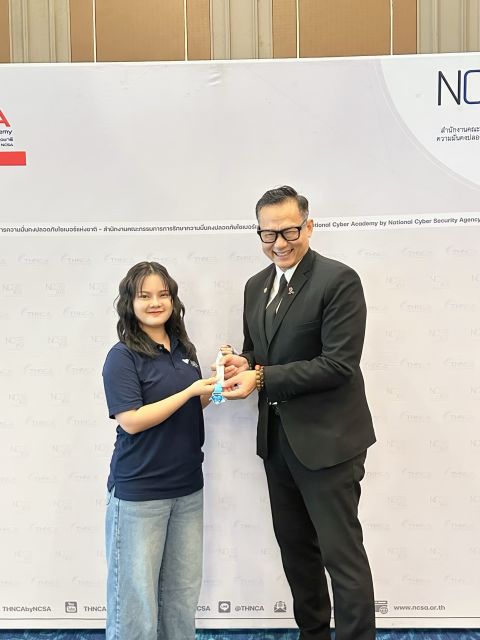 Receiving the Limited Edition medal from the NCSA Secretary General